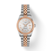 Tissot watch with two-tone rose gold and silver bracelet on a white background