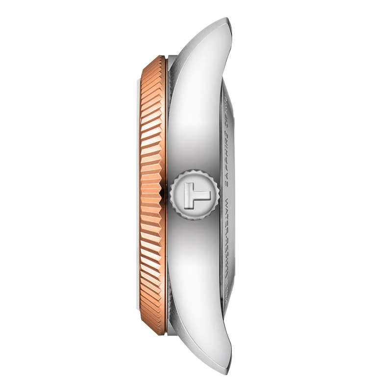 Close-up of a watch with a rose gold and silver band on a white background